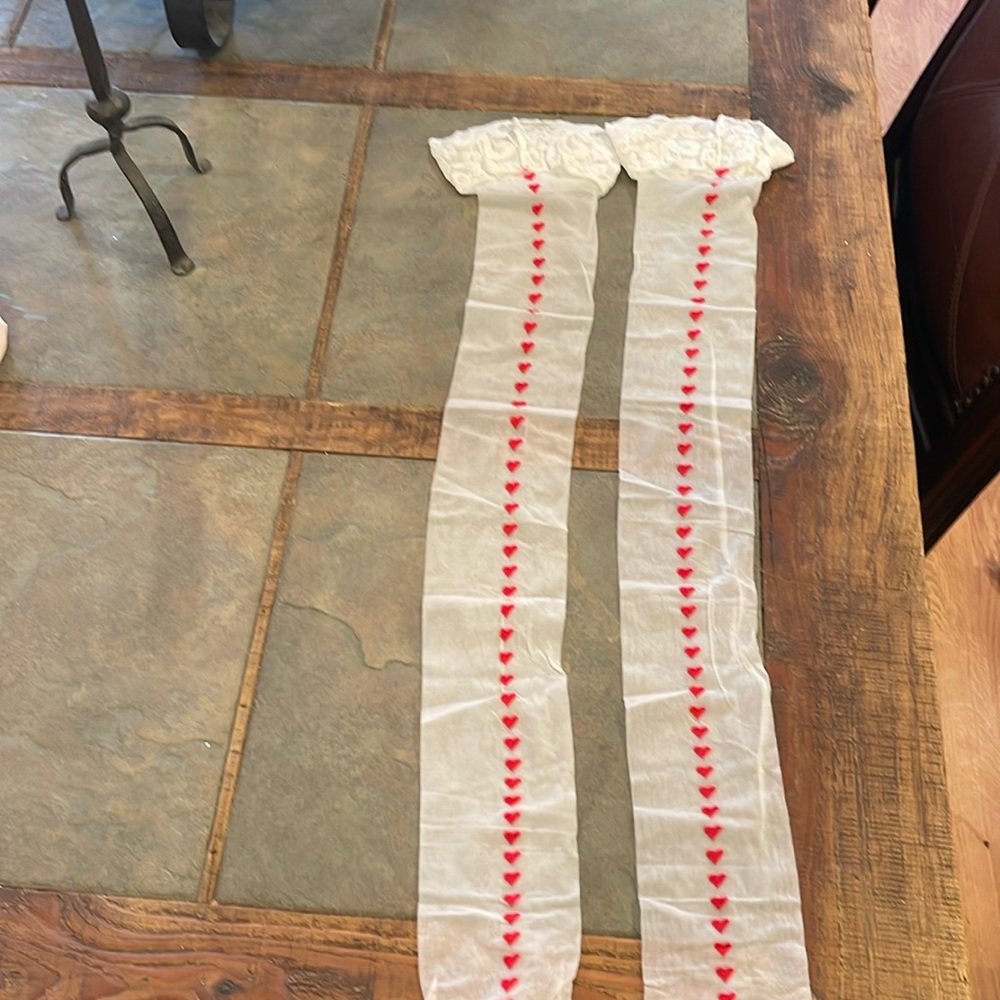 Heart printed white thigh highs.  Super cute, new.